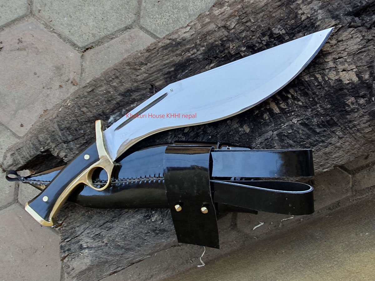 kukri with finger and hand-guard made of brass