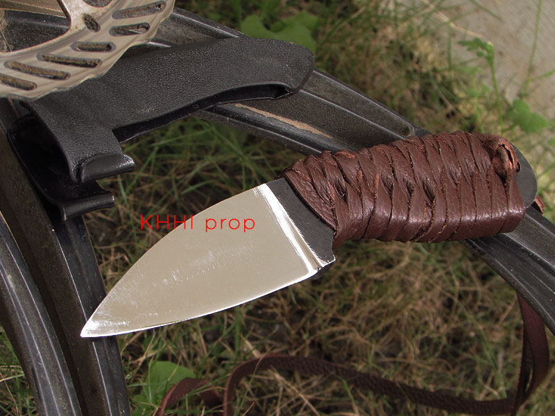 edc knife with leather wrapped handle