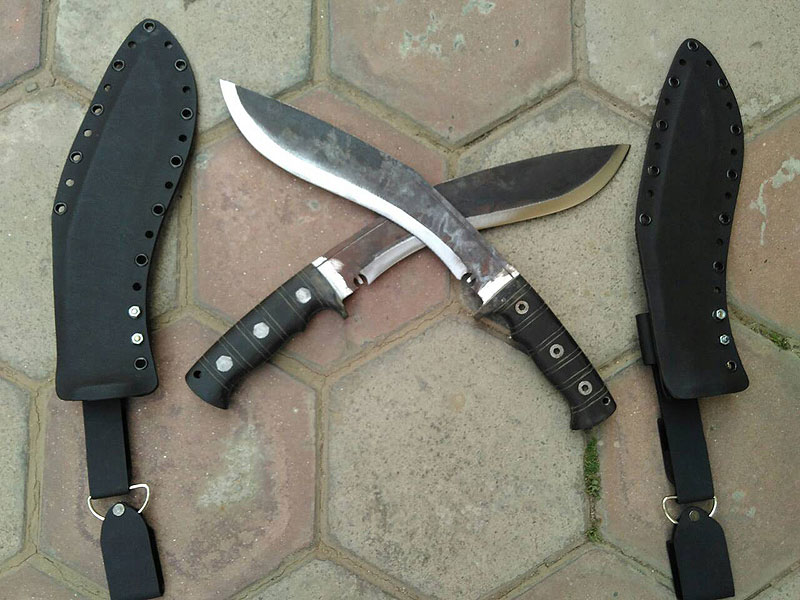 Black Kydex sheaths for kukri