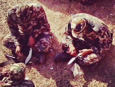 Nepali soldiers cleaning their Service kukris