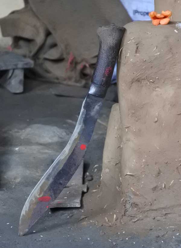 Worshipping a Kukri knife