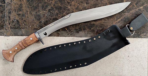 a modern gurkha Chainpure kukri with Kydex sheath